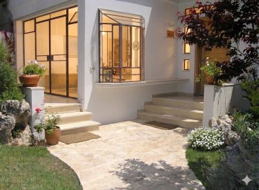 the entrance. We leveraged the site's topography to create an inviting entrance situation